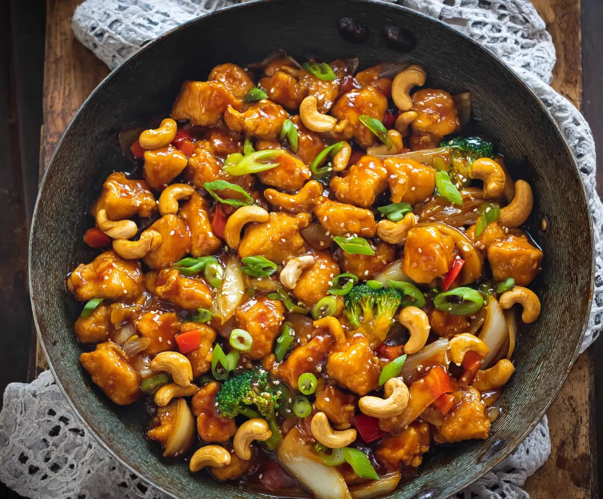 Delicious homemade Cashew Chicken with crispy vegetables and creamy sauce in an Asian-inspired dish.