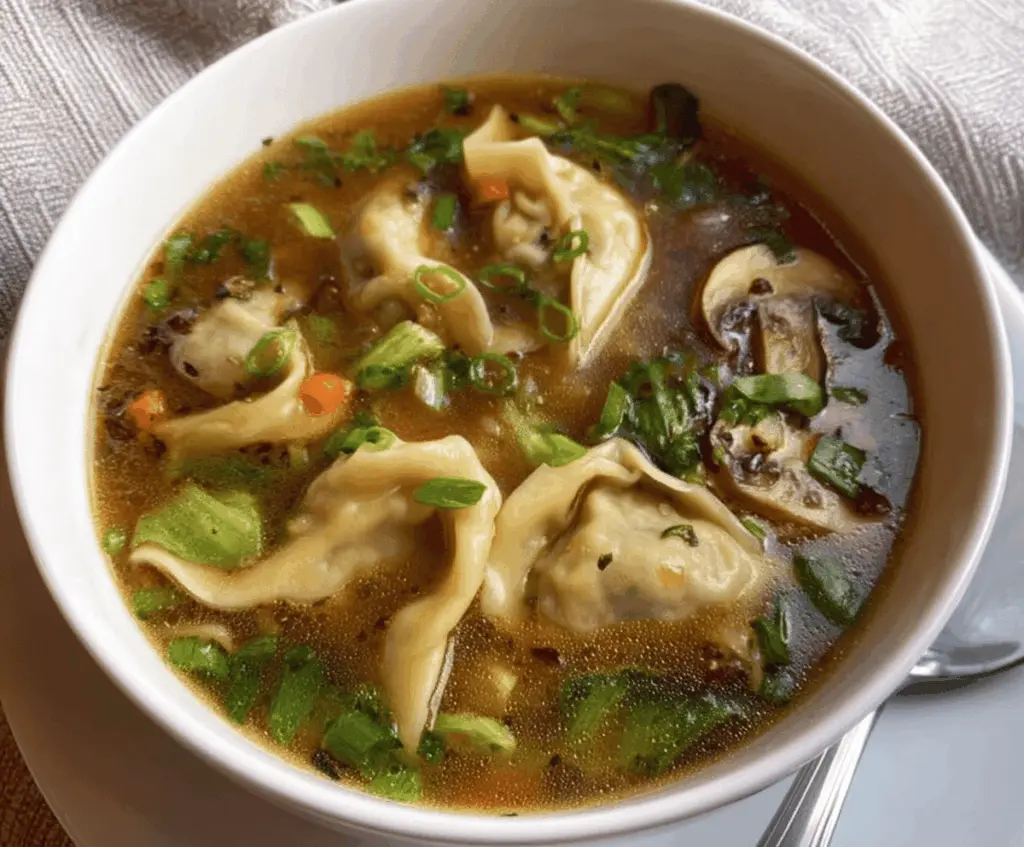 Bowl of easy potsticker soup with tender potstickers, vegetables, and flavorful broth perfect for comfort food lovers.