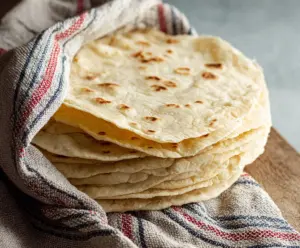 Homemade sourdough discard tortillas made with 4 simple ingredients for an easy and delicious recipe.